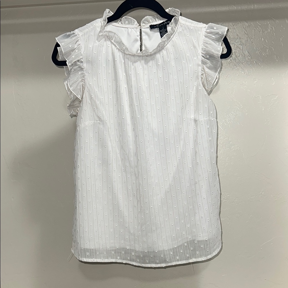 White Ruffled Sleeveless Blouse